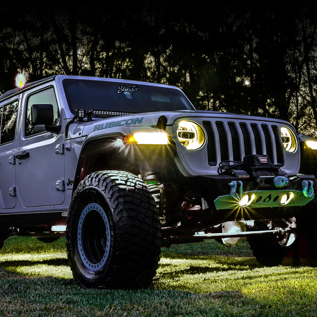 Pictured is a Jeep Wrangler JL using the bright white Stinger rock lights